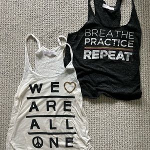 2 spiritual gangster tanks pre-loved great condition!